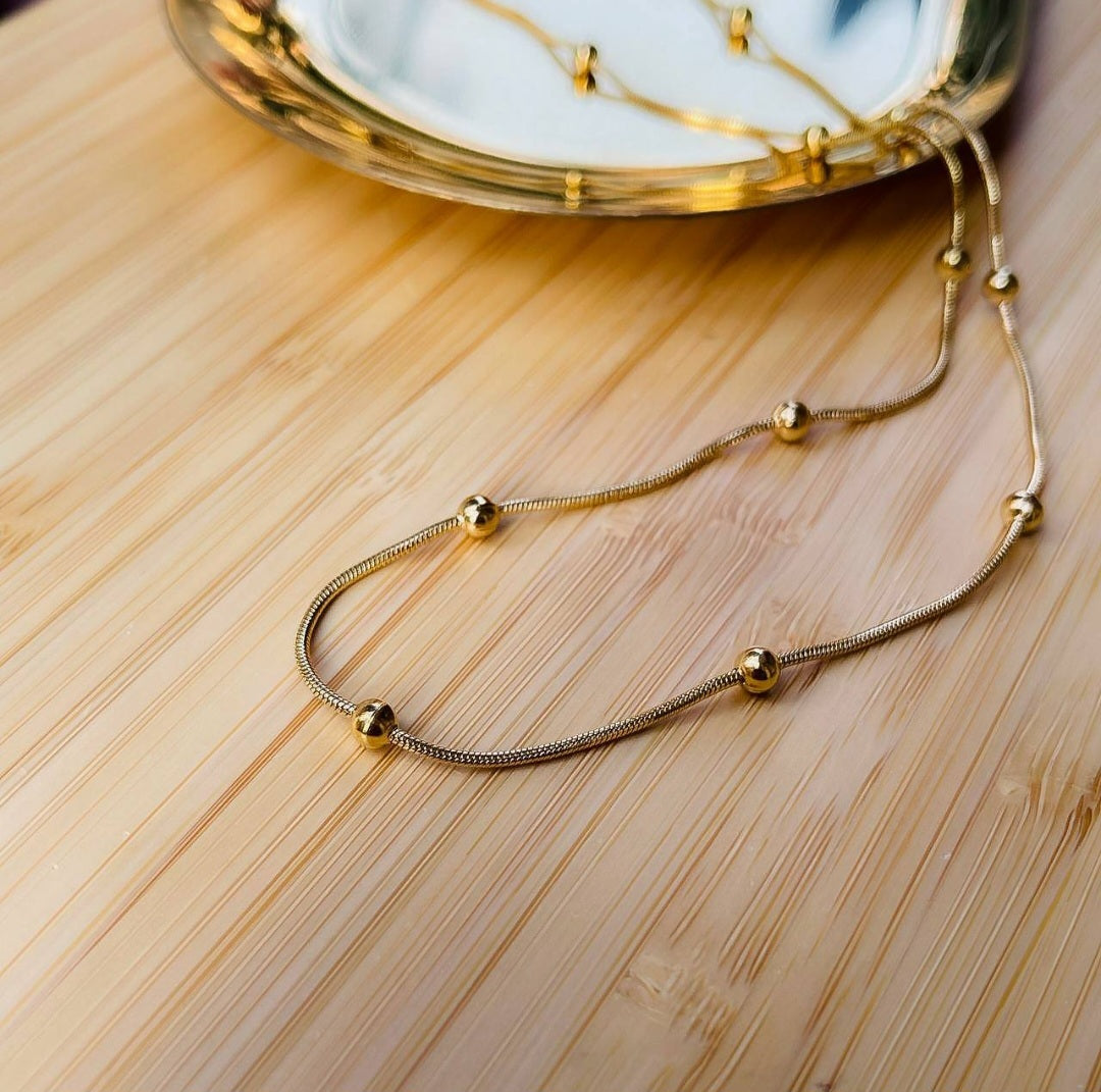"Gold Stainless Steel necklace – Elegant and Luxurious Design.