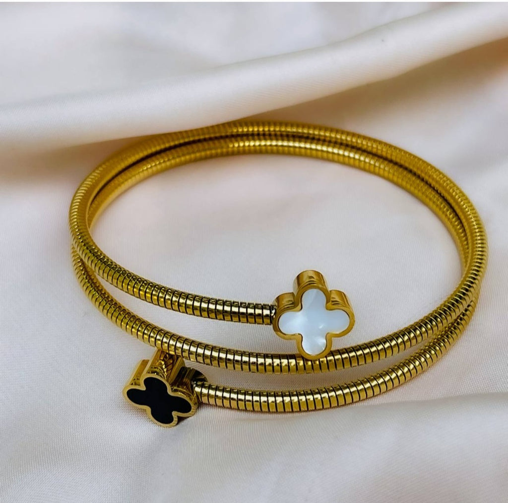 "Gold Stainless Steel Bangle – Elegant and Luxurious Design."