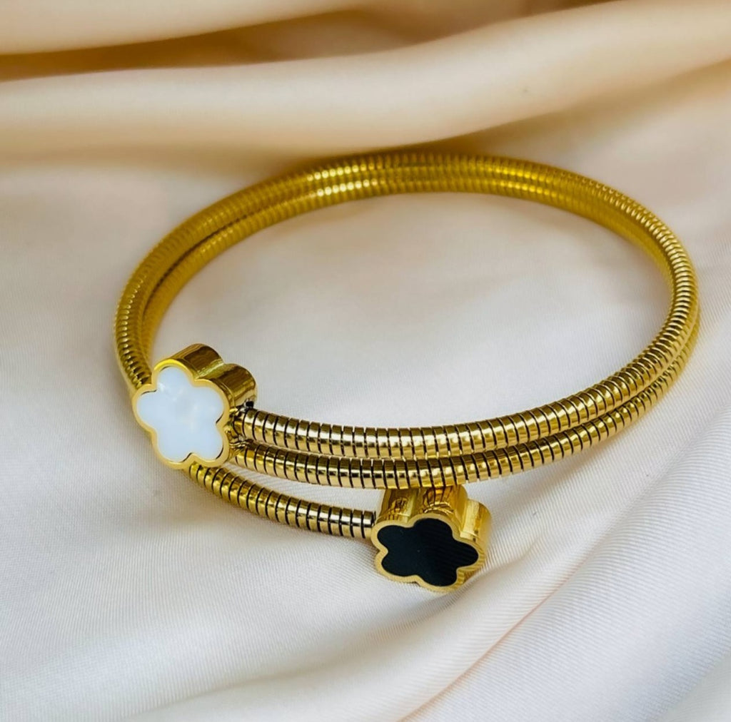 "Gold Stainless Steel Bangle – Elegant and Luxurious Design."
