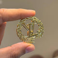 LV Brooch i
